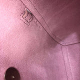 Front view of modern polished women's handbag – women's luxury accessory