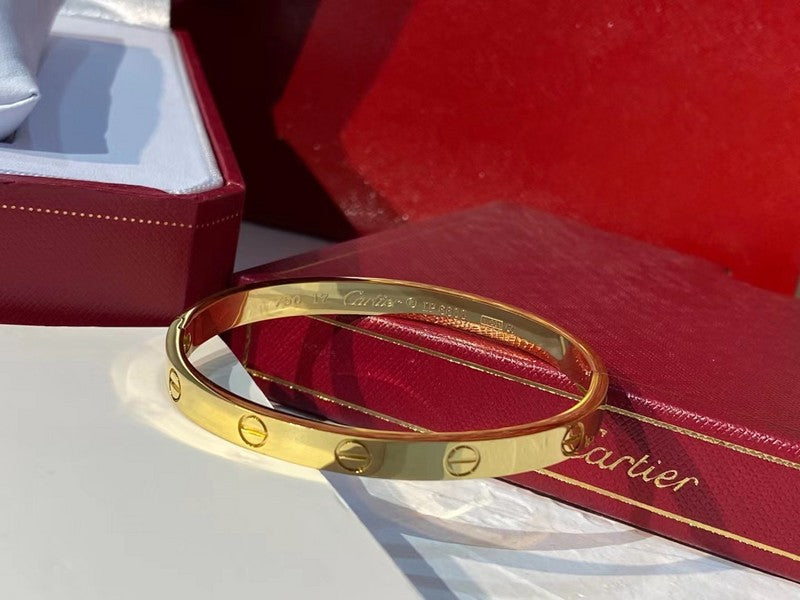 Side view of Cartier unisex jewelry piece