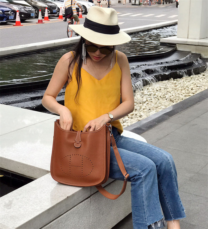 Side view of contemporary structured handbag
