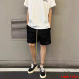 Side profile of Rhude luxury clothing with monogram-inspired silhouette