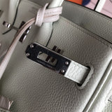  Tailored shoulder bag carried on shoulder