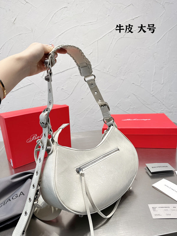Ziva's Charm handbag – carry view (one versatile size)