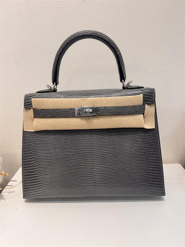 Side view of classic structured handbag