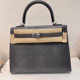 Side view of classic structured handbag
