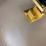 Side profile of modern classic women's handbag – women's luxury accessory