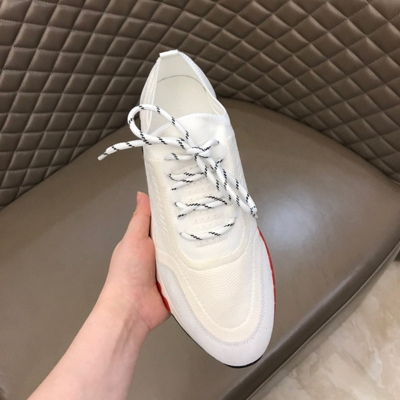 Hermès Nude High-Top Sneakers - Angled View
