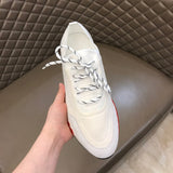Hermès Nude High-Top Sneakers - Angled View