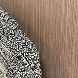 Close-up detail shot of Louis Vuitton luxury clothing with logo-detail design