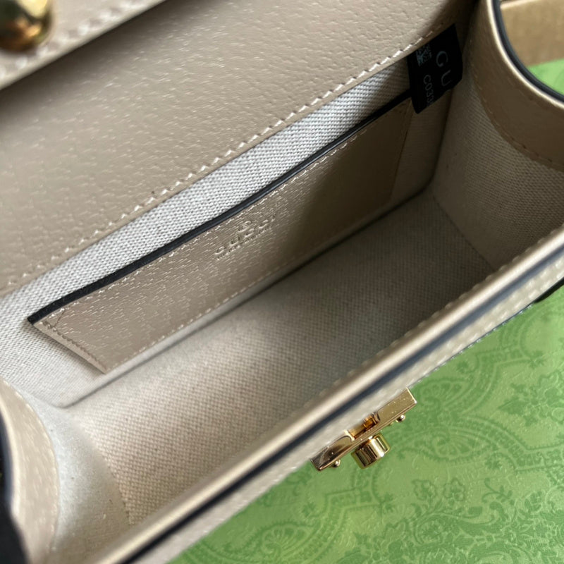 Side profile of statement refined women's handbag – women's premium purse