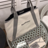 Handle and strap detail of refined statement women's handbag – women's luxury accessory