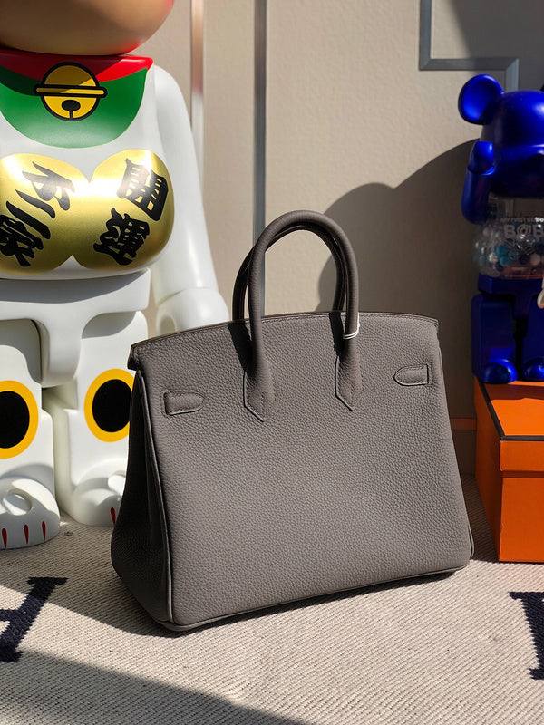 Side view of polished structured handbag
