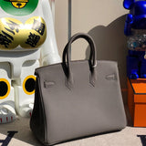 Side view of polished structured handbag