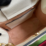 Side profile of everyday-luxe polished women's handbag – women's statement bag