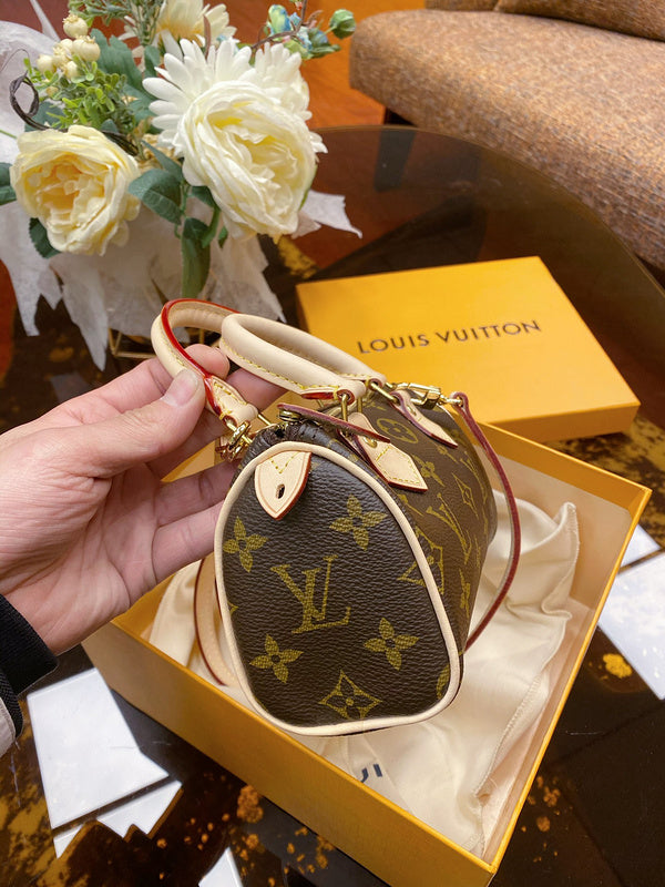 Side profile of chic sleek women's handbag – women's statement bag