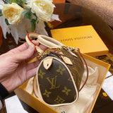 Side profile of chic sleek women's handbag – women's statement bag
