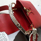 Front view of elevated polished women's handbag – women's luxury handbag