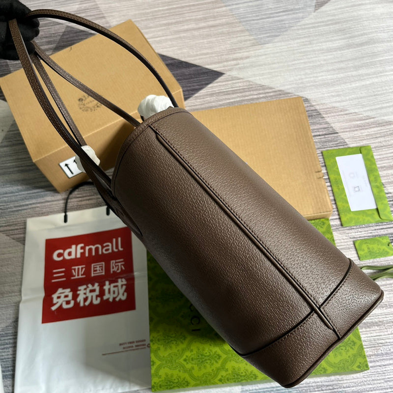 Top view of polished modern women's handbag – women's luxury accessory