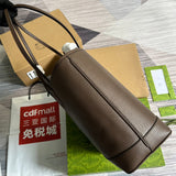 Top view of polished modern women's handbag – women's luxury accessory