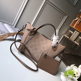 Front view of modern sleek women's handbag – women's everyday handbag