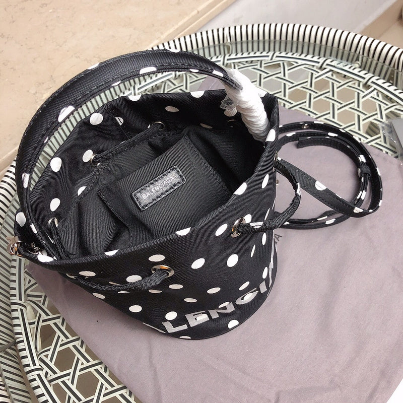 Top view of polished elevated women's handbag – women's luxury accessory