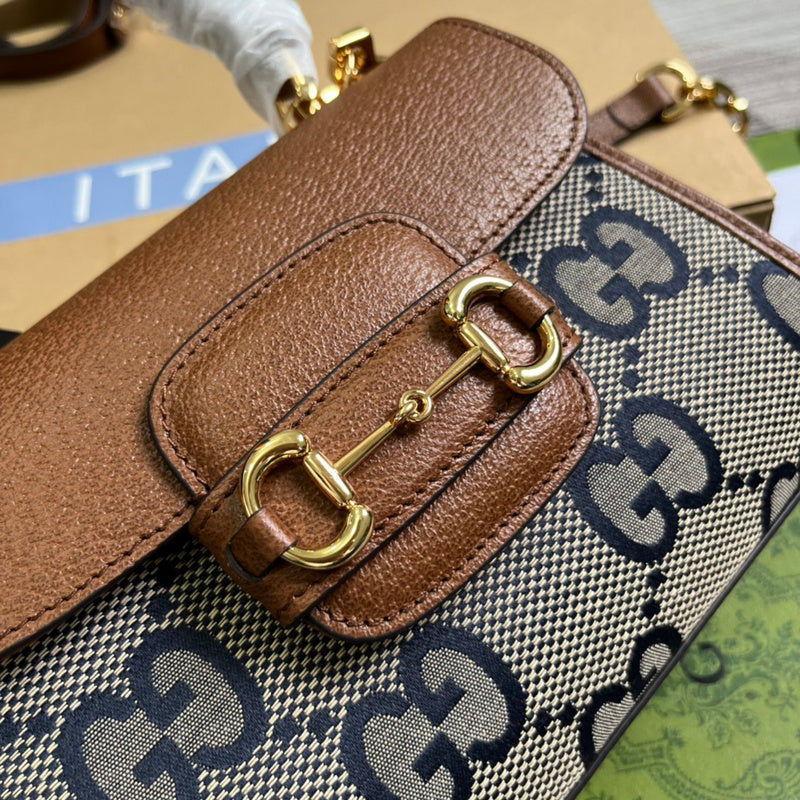 Styled lifestyle shot of sleek premium women's handbag – women's luxury accessory