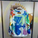 Side profile of Louis Vuitton luxury clothing with signature branding