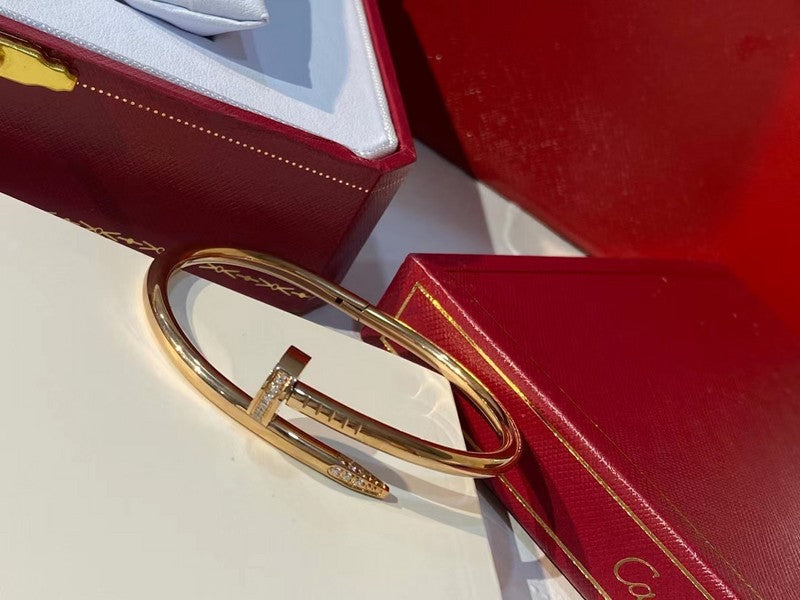 Close-up detail view of Cartier unisex jewelry piece