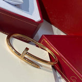 Close-up detail view of Cartier unisex jewelry piece