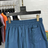 Front view of Rhude luxury clothing with label-forward styling