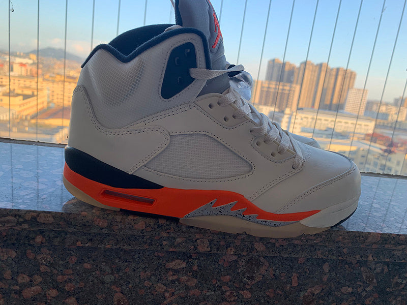 Nike Men's & Women's Iconic Street Trainers — Style 179 back view