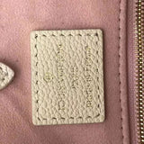 Side profile of chic everyday-luxe women's handbag – women's luxury accessory