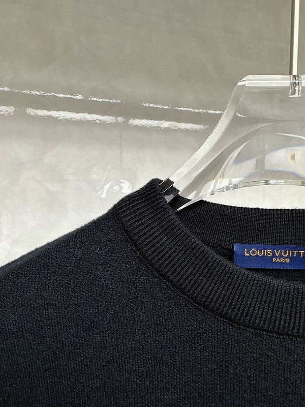 Close-up detail shot of Louis Vuitton luxury clothing with contemporary cut
