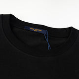 Flat lay presentation of Louis Vuitton cotton t-shirt with contemporary cut