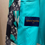 Close-up detail shot of Louis Vuitton luxury clothing with tailored silhouette