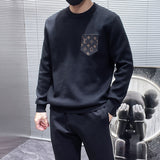 Close-up detail shot of Louis Vuitton luxury clothing with relaxed-fit cut