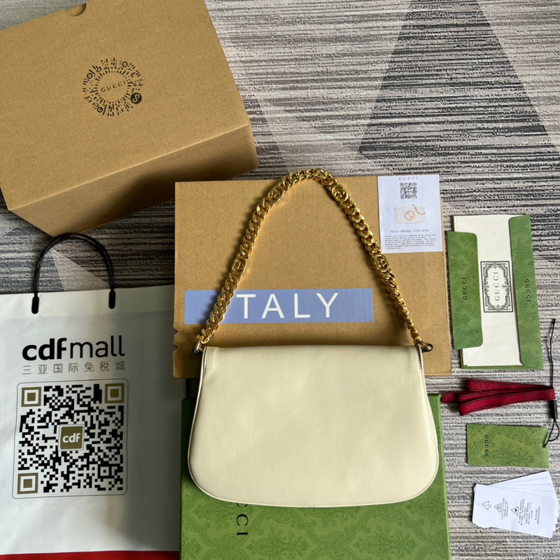 Styled lifestyle shot of signature modern women's handbag – women's statement bag