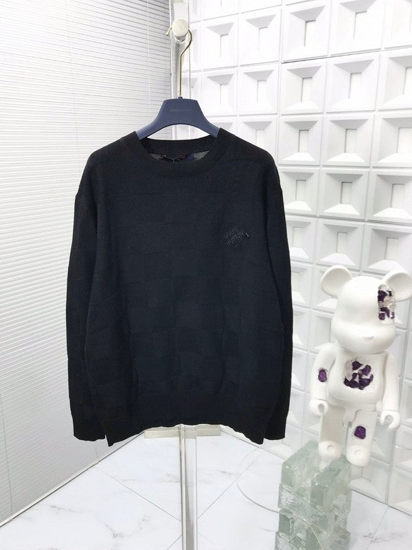 Side profile of Louis Vuitton luxury clothing with signature branding