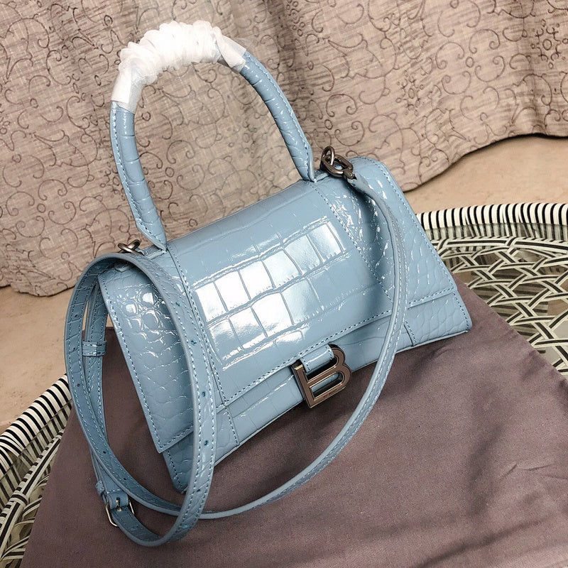 Front view of polished classic women's handbag – women's luxury accessory