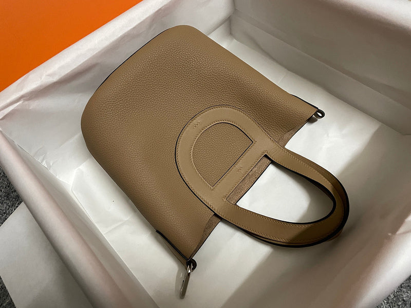 Side view of clean-lined structured handbag