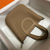 Side view of clean-lined structured handbag