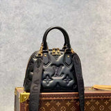 Side profile of elevated chic women's handbag – women's luxury accessory