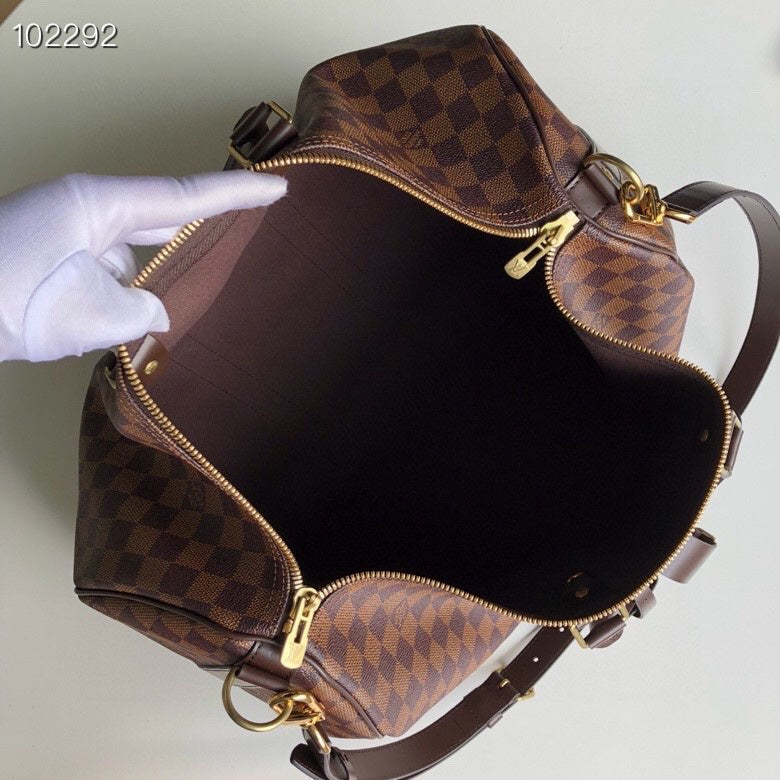 Side profile of signature elevated women's handbag – women's luxury handbag