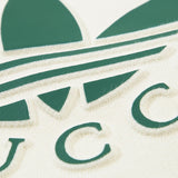 Flat lay presentation of Gucci luxury clothing with streetwear-inspired cut