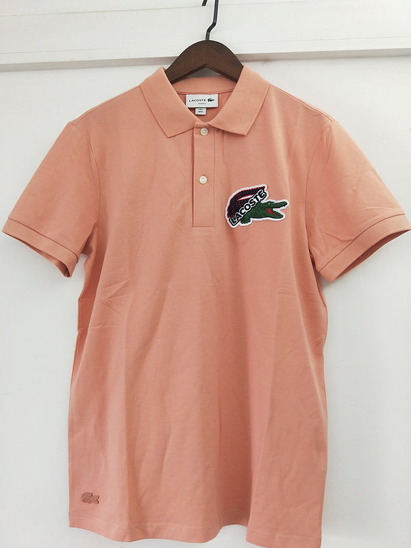 Front view of Lacoste luxury clothing with tailored silhouette