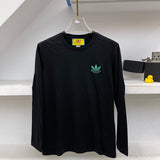Side profile of Gucci luxury clothing with logo-detail design