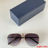 Angled view of Louis Vuitton unisex sunglasses