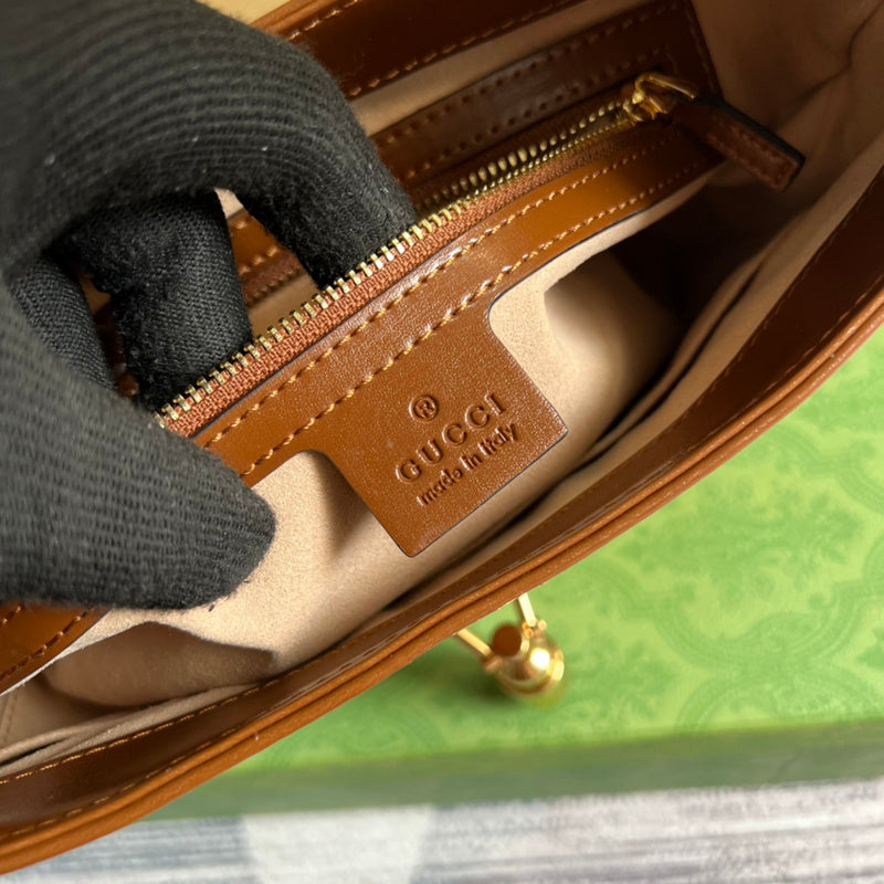 Close-up detail of polished sleek women's handbag – women's designer-style accessory