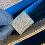 Side profile of polished everyday-luxe women's handbag – women's luxury accessory