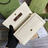 Styled lifestyle shot of sleek signature women's handbag – women's luxury accessory