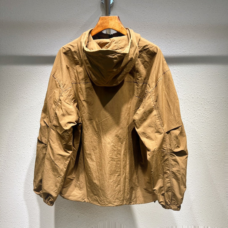 Side profile of Louis Vuitton luxury clothing with label-forward styling